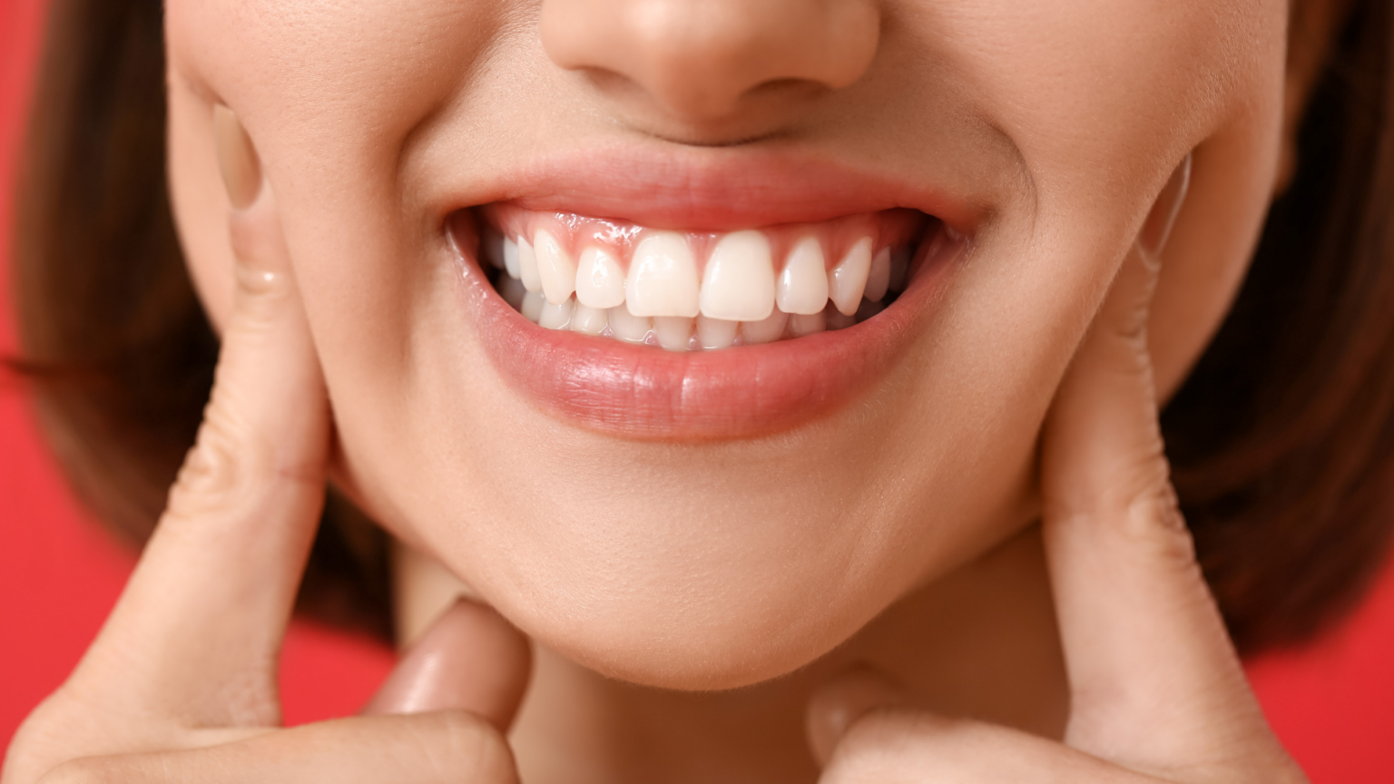 photo of smiling patient with healthy gums and teeth